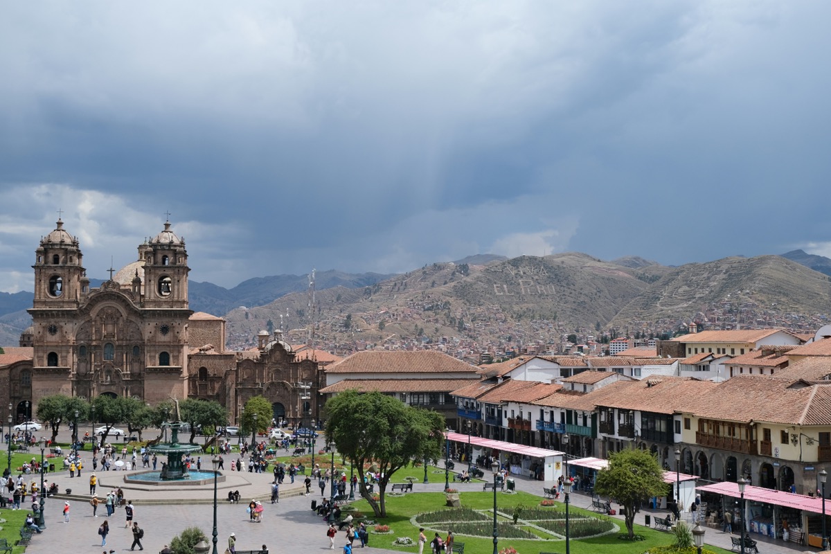 Plaza de Armas in Cusco with the cathedral and terrace restaurants lining the square, Peru
