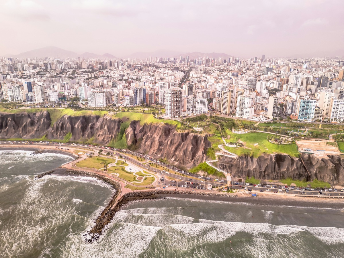 Aerial view of Lima's Miraflores coast with cliffs and Pacific Ocean, Peru