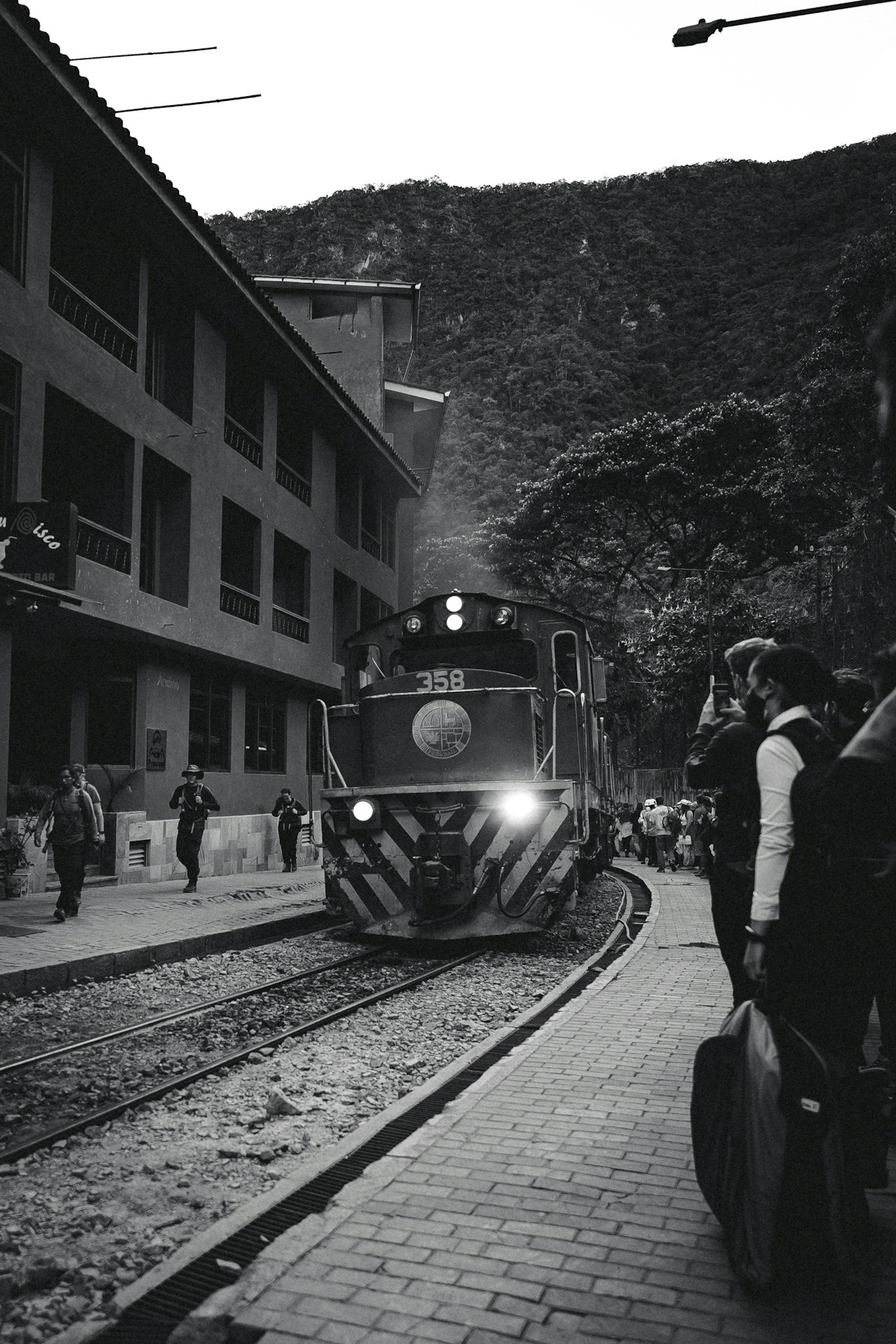 PeruRail train arriving at Aguas Calientes station near Machu Picchu, Cusco region, Peru