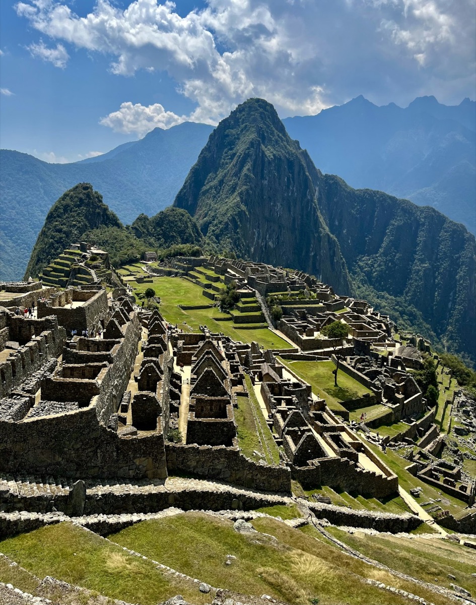 Machu Picchu Inca ruins with terraces and Huayna Picchu mountain, Peru
