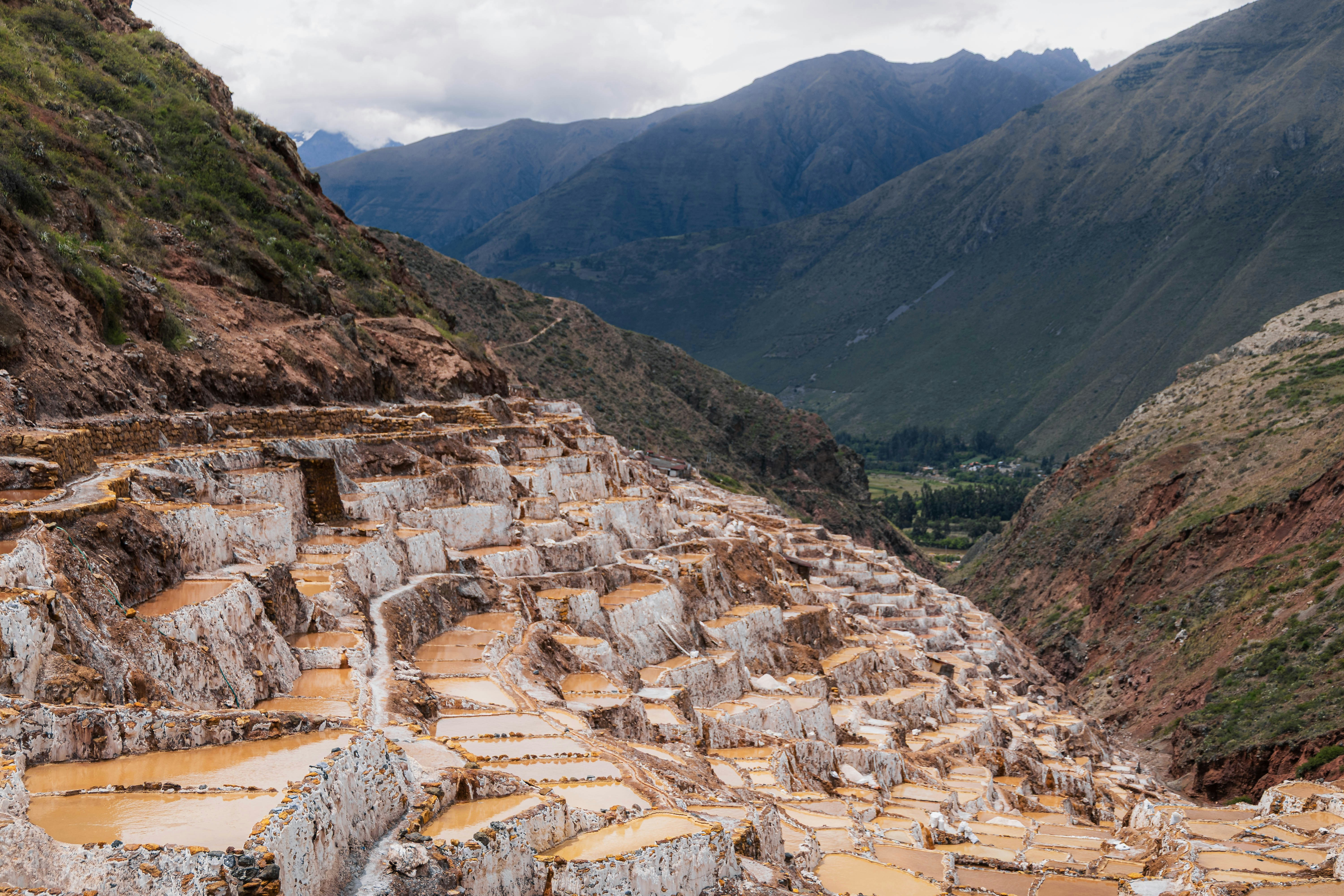 Terraced salt pans carved into the mountainside at Maras, Sacred Valley, Peru