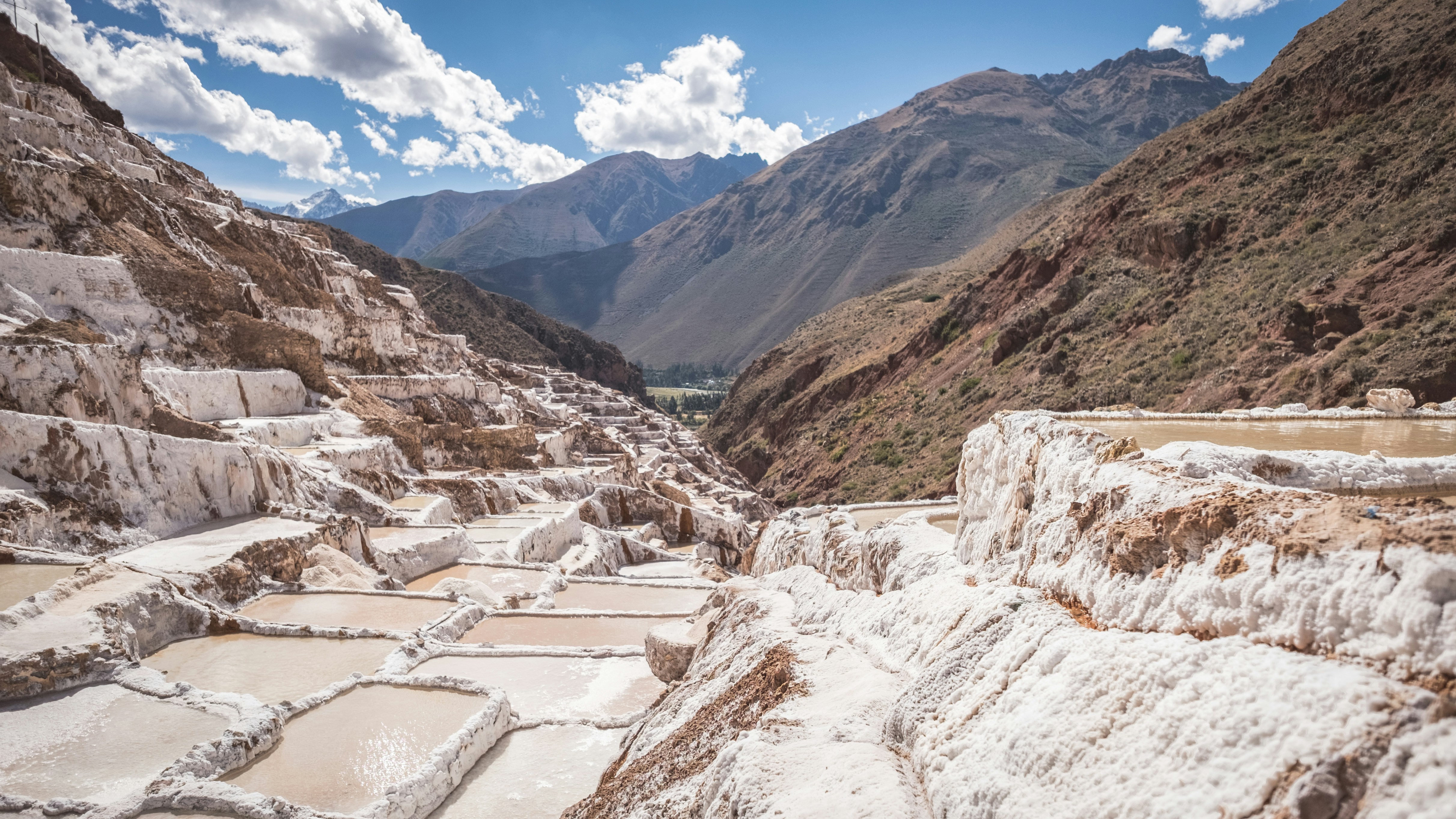 White salt evaporation terraces at Maras Salt Mines in the Sacred Valley, Peru